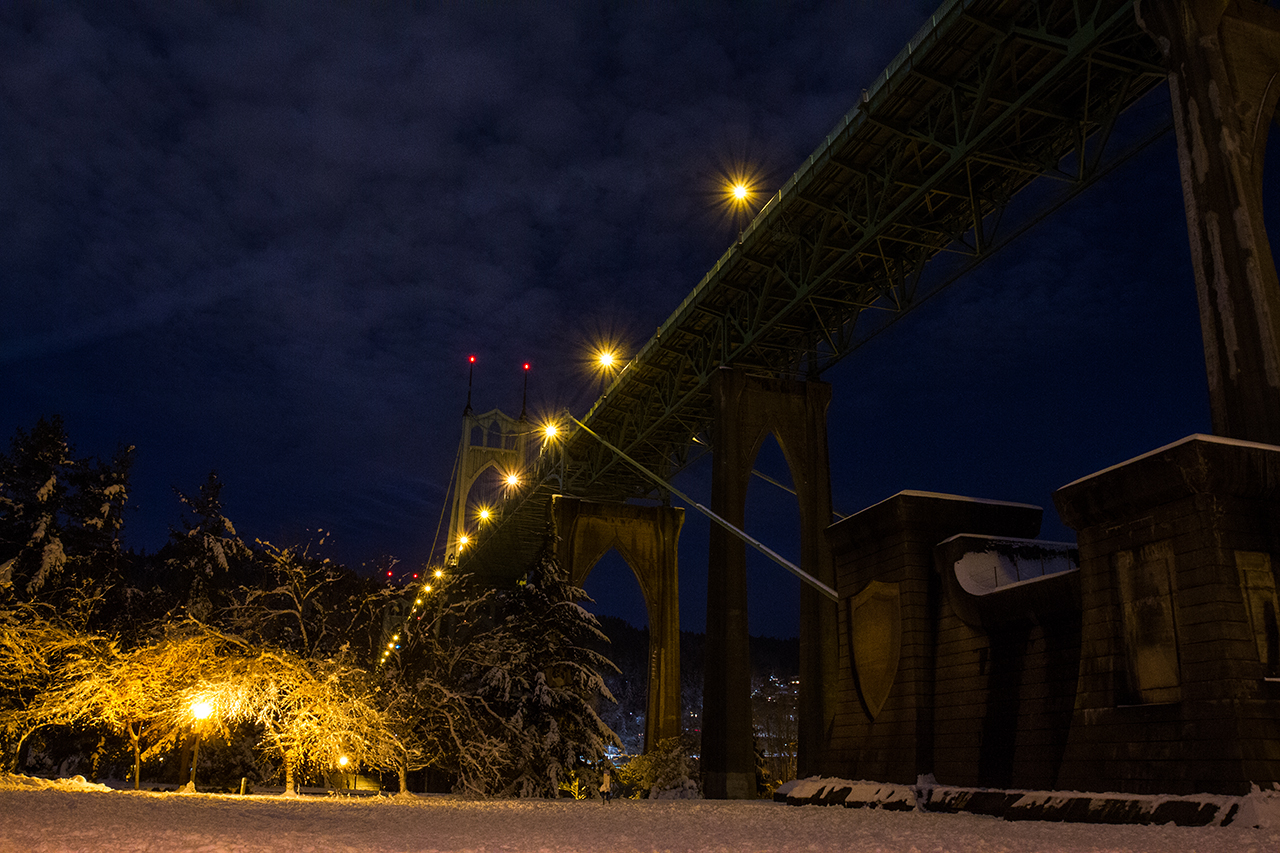 Looking up at St Johns bridge in Portland Oregon during snowy winter